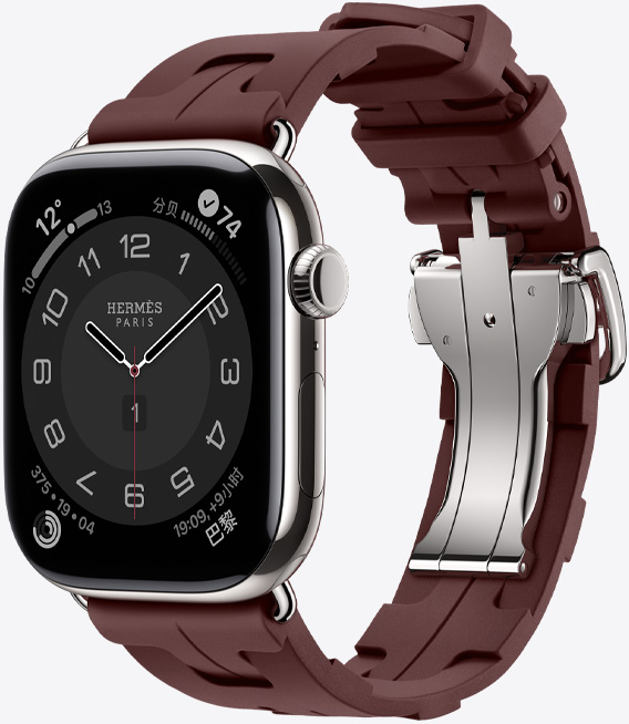 Apple Watch Hermès Series 11，展示银色钛金属表壳、Bordeaux 酒红色 Kilim 表带、可快速脱卸的银色金属折叠扣