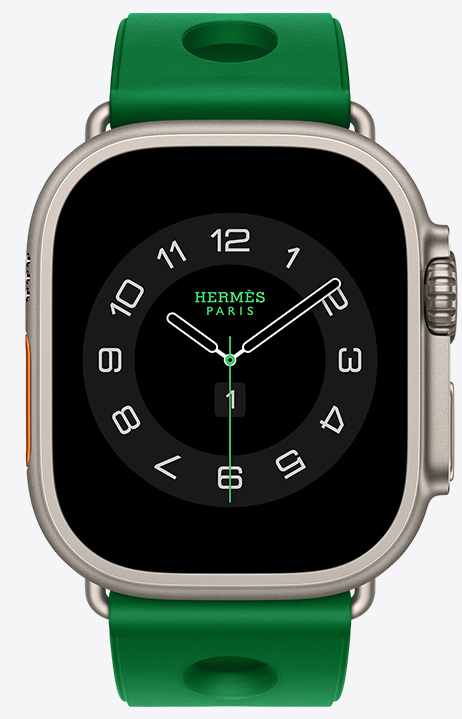 Apple Watch Hermès Ultra 4,展示 Circulaire 模拟表盘 (时针、分针和秒针,以及天气、健身圆环、巴黎时间、紫外线指数复杂功能),原色钛金属表壳,展示右侧外观、数码表冠、凸起的侧边按钮,搭配 Vert Vertigo 炫绿色 (亮绿色系) Scub'H Diving 表带,表带采用橡胶模塑成型,中央具有圆形开孔。