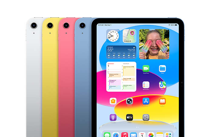 四种颜色的 iPad 排成一排，分别是银色、黄色、粉色和蓝色的，屏幕上展示墙纸和各种 app。