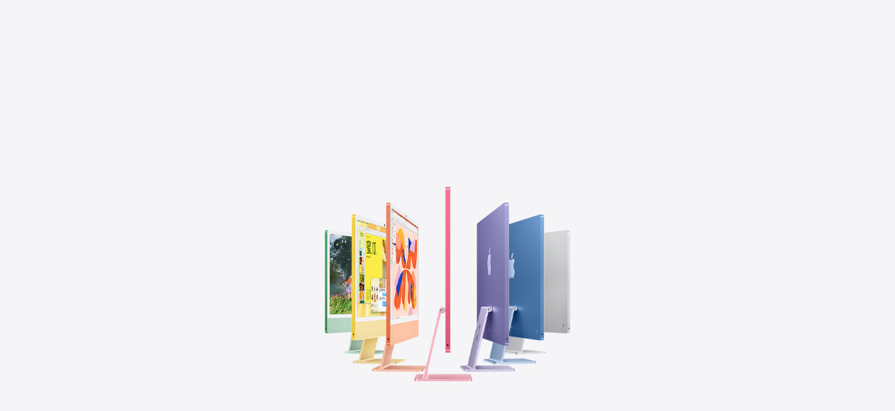 绿色、黄色、橙色、粉色、紫色、蓝色和银色七款 iMac 机型呈手风琴状排列。