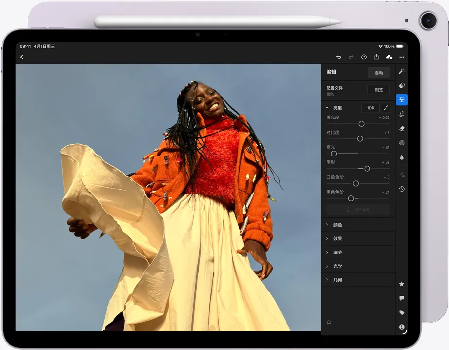 iPad Air 的正面外观，Apple Pencil Pro 吸附在设备顶部，屏幕显示第三方图像处理软件中正在编辑的图片。
