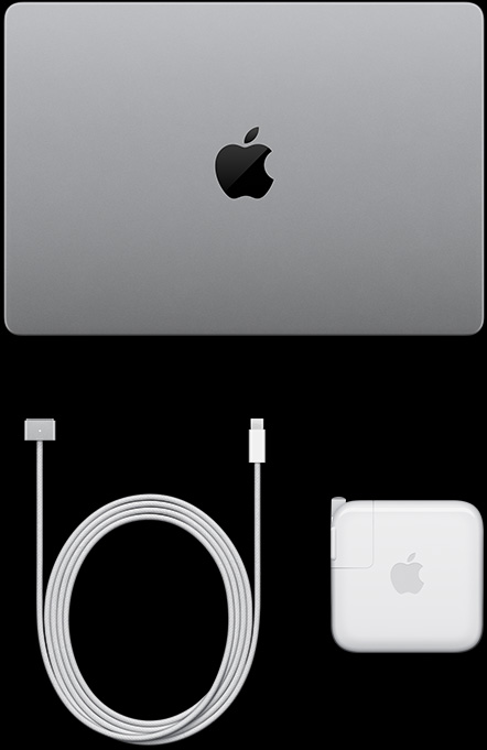 配备 PROLED XDR 显示屏的 MacBook Pro，银色外观，呈闭合状态，顶部俯视图，配有 USB-C 充电线和电源适配器。