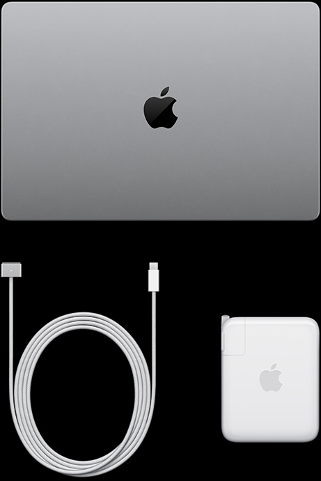 配备 PROLED XDR 显示屏的 MacBook Pro，银色外观，呈闭合状态，顶部俯视图，配有 USB-C 充电线和电源适配器。