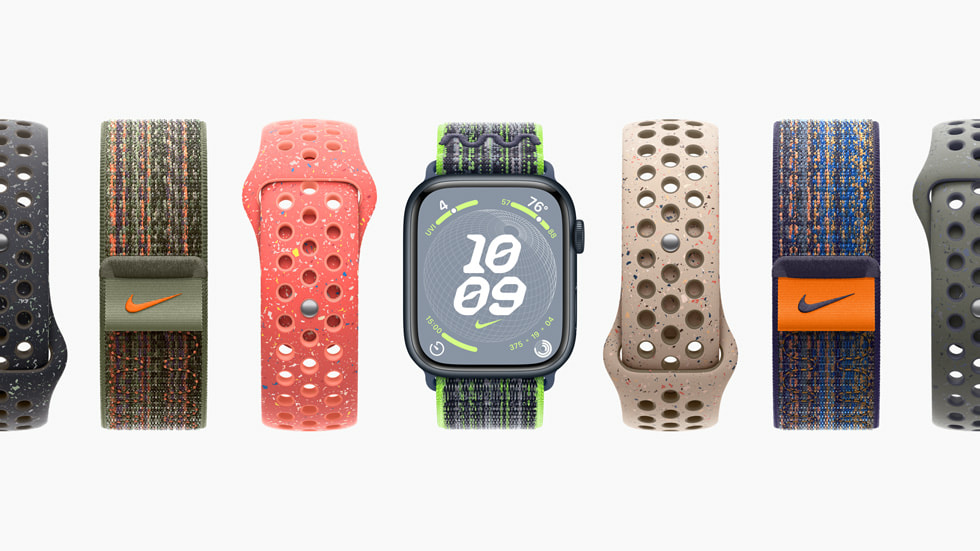 七支 Apple Watch Series 9 设备搭配不同配色的 Nike 回环式运动表带和 Nike 运动表带。