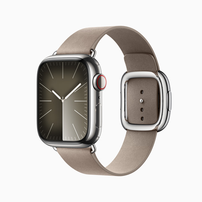 搭配灰色精织斜纹现代风扣式表带、银色不锈钢表壳的 Apple Watch Series 9。