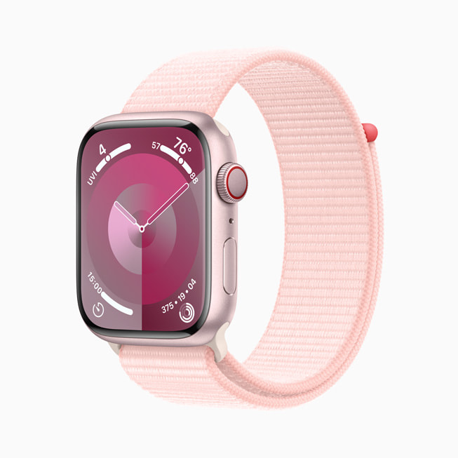 粉色铝金属 Apple Watch Series 9 搭配粉色回环式运动表带。