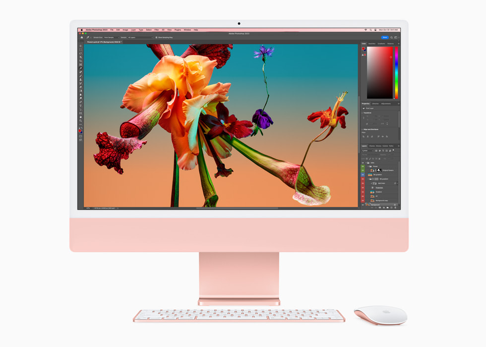 图中是 Adobe Photoshop app 的画面，显示在搭载 M3 芯片并搭配同系列配色键盘和鼠标的粉色新款 iMac 的显示屏上。