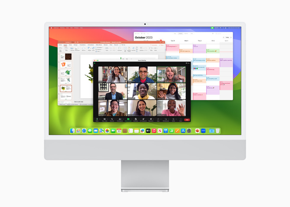 图中是在 macOS Sonom 操作系统中运行的 Microsoft PowerPoint、Zoom、日历三款 app 的画面，显示在搭载 M3 芯片的银色新款 iMac 的显示屏上。