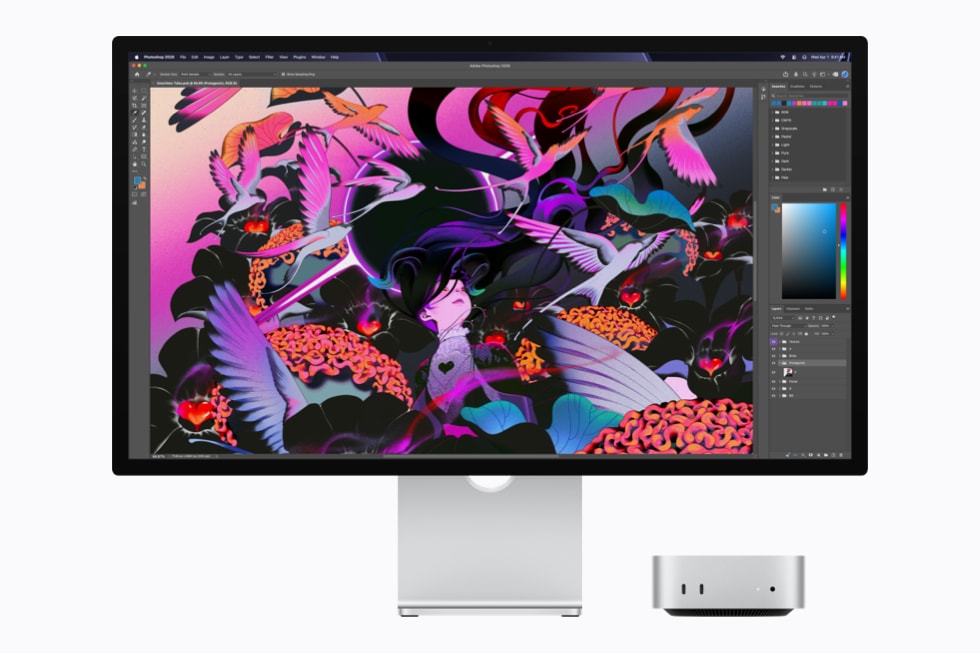 搭载 M6 芯片、配有显示器的 Mac mini 正在运行视频剪辑软件。