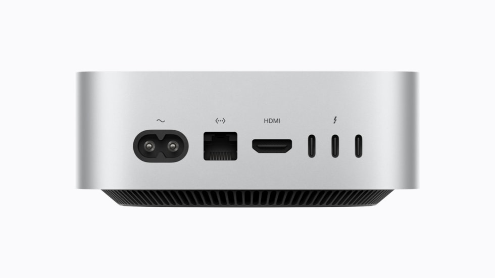 Mac mini 背面视图，展示雷雳 5 端口、HDMI 端口和以太网端口。