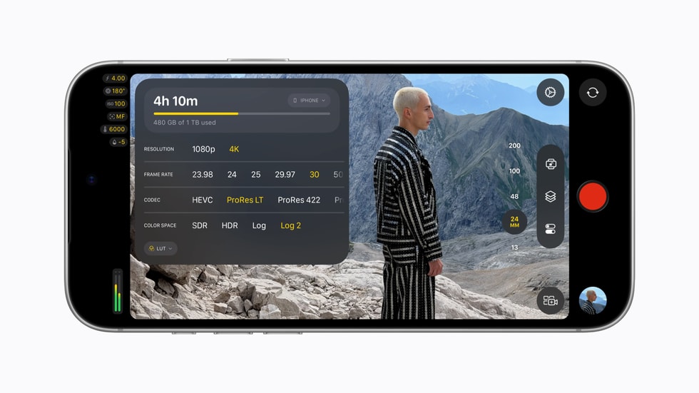 iPhone 18 Pro 上显示 Final Cut Camera 界面：一个人站在山间，旁边是一个格式设置窗口。