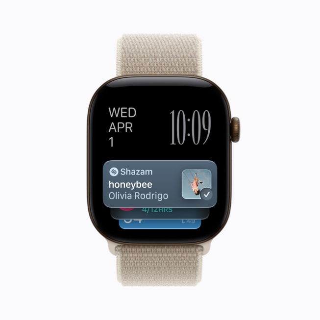 Apple Watch Series 12 上展示着 Shazam 检测到了 Olivia Rodrigo 的歌曲《Honeybee》。