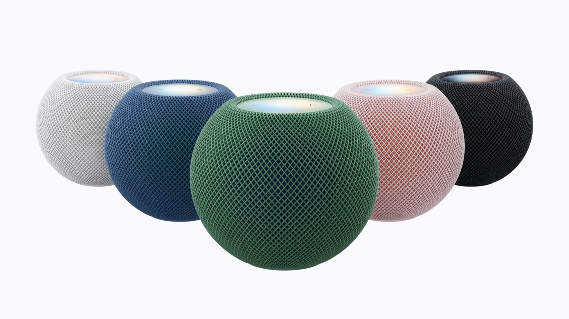 展示白色、蓝色、绿色、粉色和午夜色 HomePod mini 2。