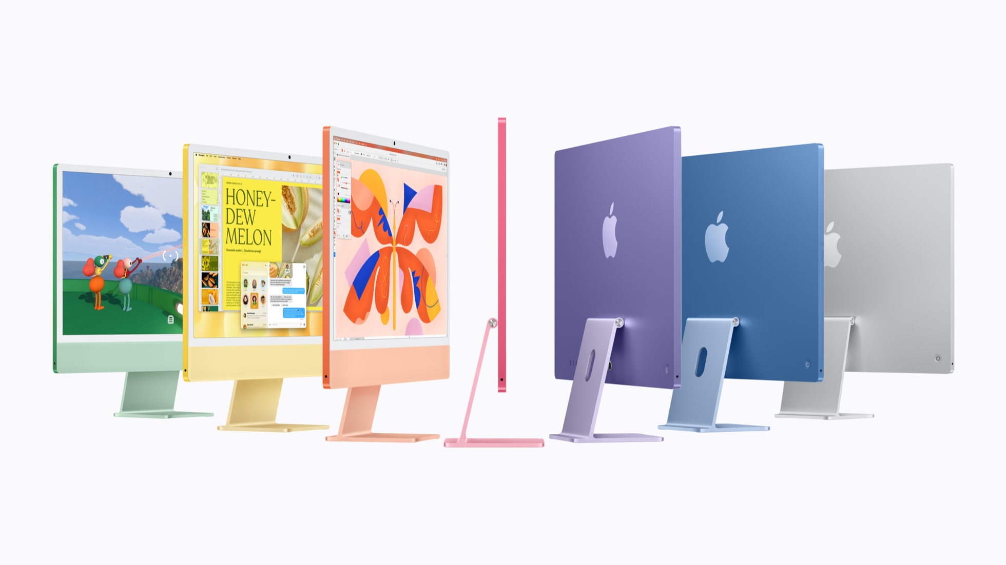 七台搭载 M6 芯片的 iMac，分别为绿色、黄色、橙色、粉色、紫色、蓝色和银色。