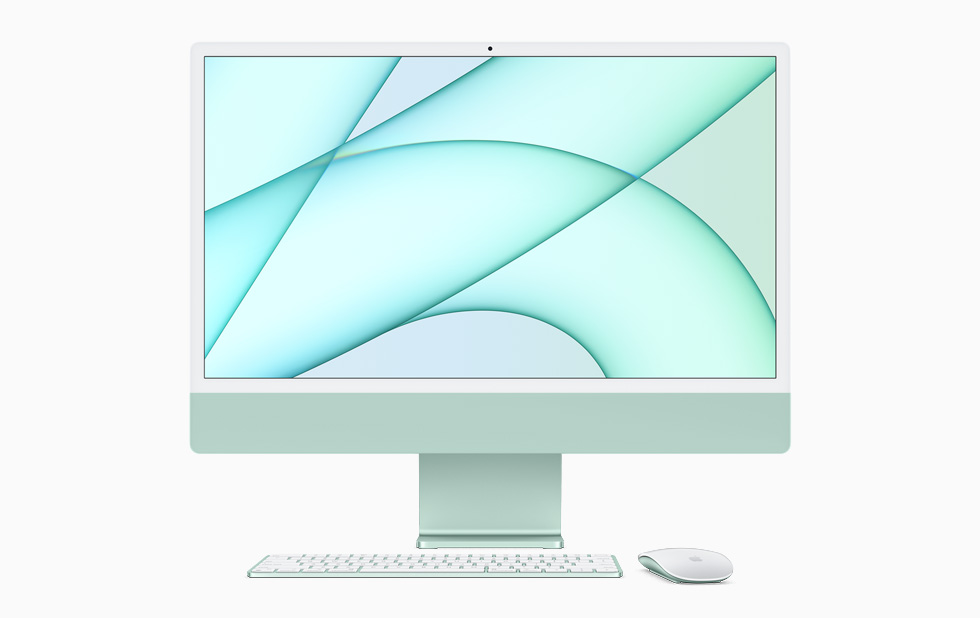 绿色 iMac 搭配同色系妙控键盘和妙控鼠标。