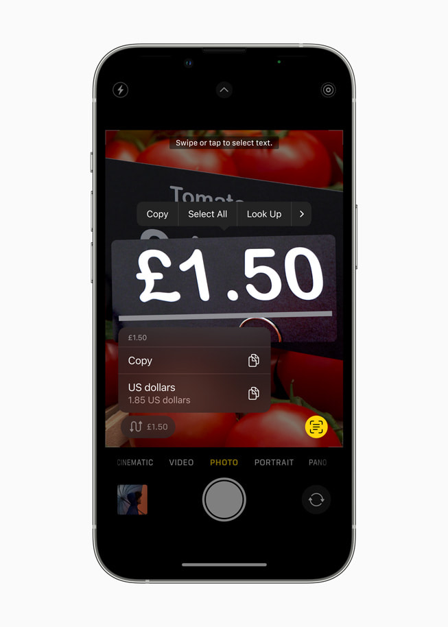 iPhone 13 Pro 上展示着实况文本功能将英镑价格转换为美元。