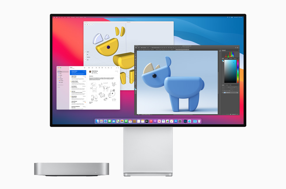 银色 Mac mini 搭配 Pro Display XDR。 