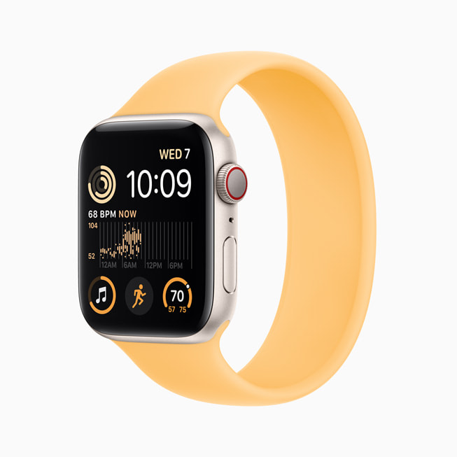 星光色铝金属表壳的新款 Apple Watch SE。 