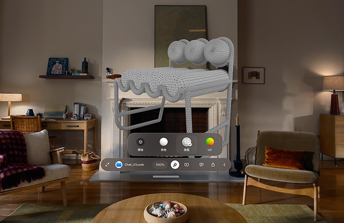 Apple Vision Pro 所呈现的画面，展示快速查看功能的通知窗口，其中提及一把椅子的 USDZ 文件，窗口后方可见椅子的线框图。