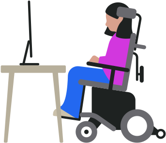 一个坐在电动轮椅上的人，看着桌上的 Mac 电脑