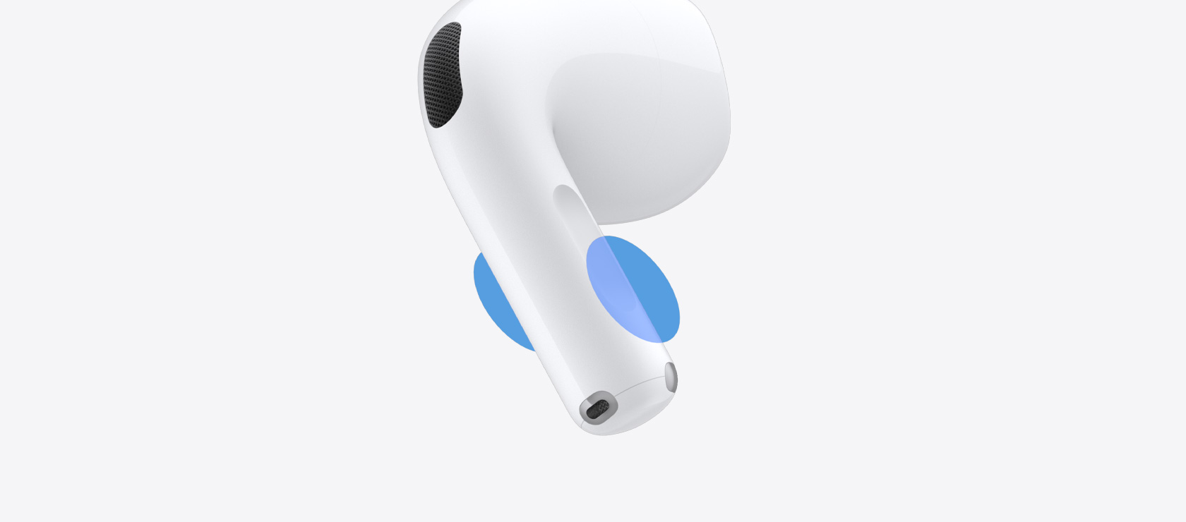 AirPods 5 耳机柄上的蓝色圆形区域，指示在该位置轻扫可控制音量。