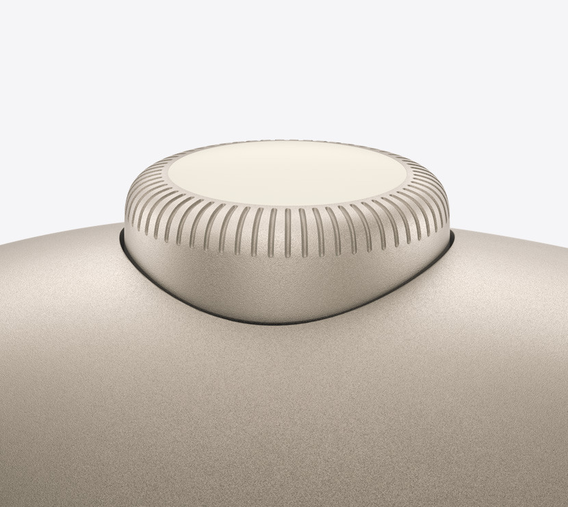 星光色 AirPods Max 2 耳机，展示数码旋钮的细节。
