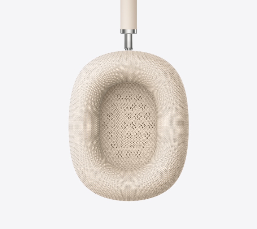 星光色 AirPods Max 2 耳机，展示耳垫内侧的细节。