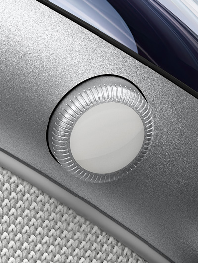 Apple Vision Pro 的侧面特写视图，展示数码旋钮。