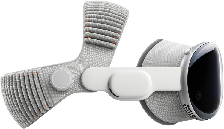 Apple Vision Pro 的侧面视图，展示铝合金外框，装有遮光罩、音频带和双圈编织头带。