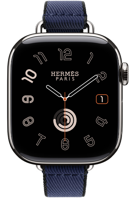 Apple Watch Hermès Series 11，展示银色钛金属表壳、Radial 表盘和 Navy/Noir 深海军蓝配黑色 Twill Jump Attelage Single Tour 表带