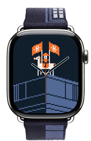 Apple Watch Hermès Series 11，展示银色钛金属表壳、Faubourg Party 表带和福宝派对表盘。