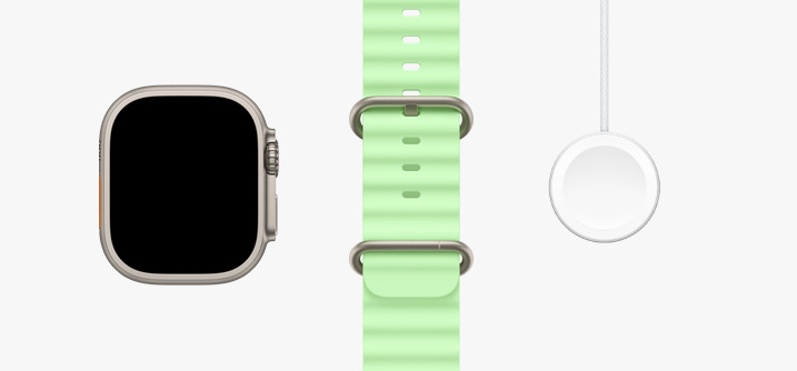 Apple Watch Ultra 3，展示原色钛金属表壳、全面屏设计、霓虹绿色海洋表带、Apple Watch 磁力充电器转 USB-C 连接线。