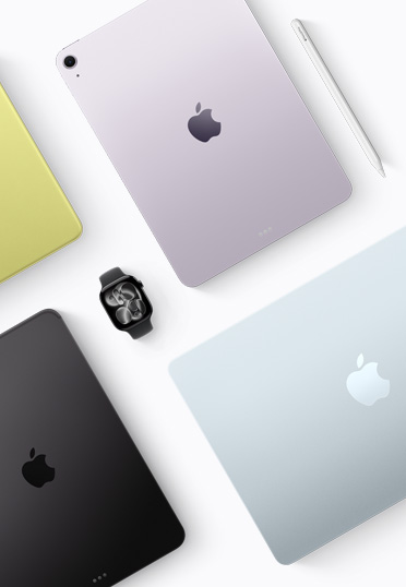 不同外观颜色的 Mac 和 iPad 设备的俯视图，中间有一只黑色 Apple Watch