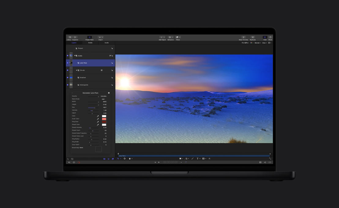 16 英寸 MacBook Pro 屏幕显示白雪皑皑的广角风景画面及镜头眩光效果。