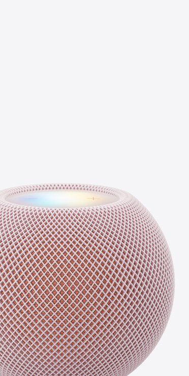 粉色 HomePod mini 2 的特写视图，展示亮起的顶部面板。