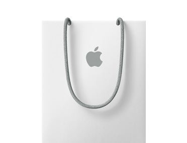 一个白色 Apple Store 零售店购物袋，袋身印有灰色 Apple 标志，配有灰色提手。