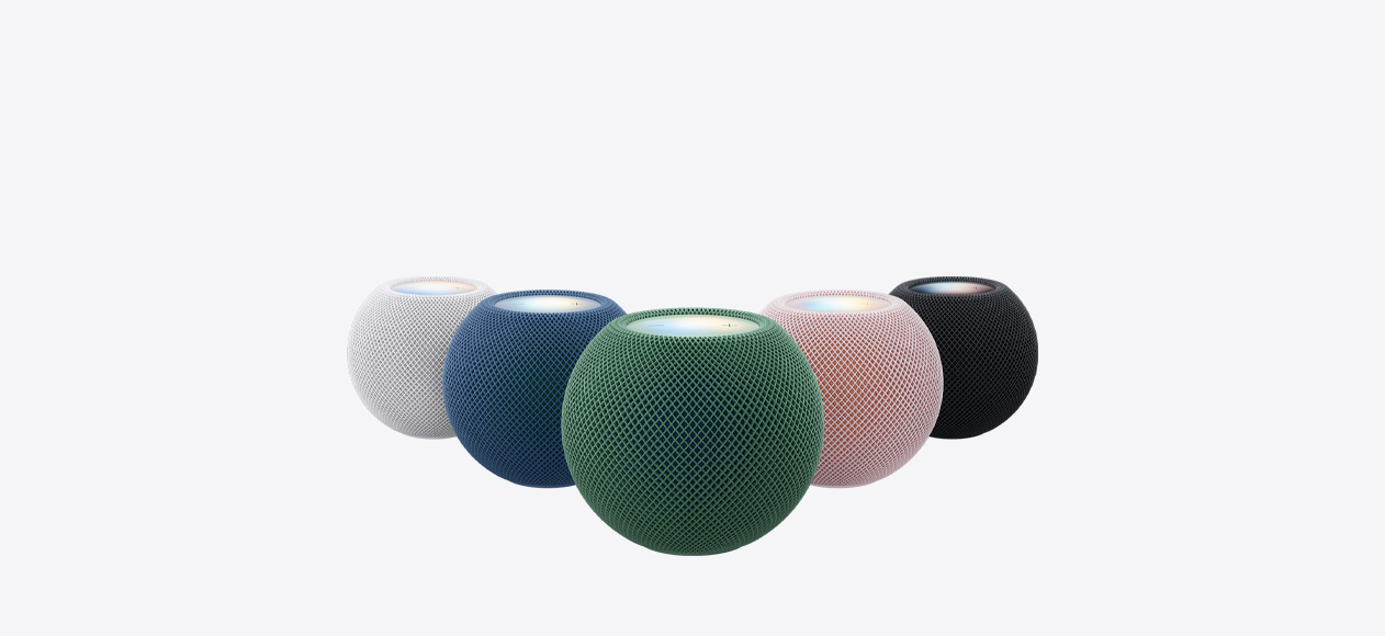 HomePod mini 2，展示全部五款颜色：白色、粉色、绿色、蓝色和午夜色。