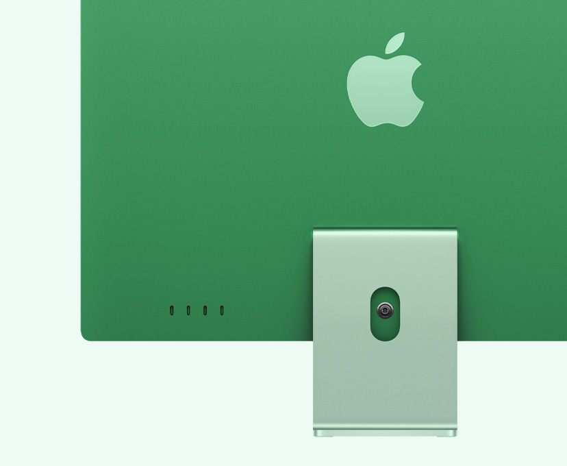 绿色 iMac 背面外观，突出展示 4 个 USB-C 端口。