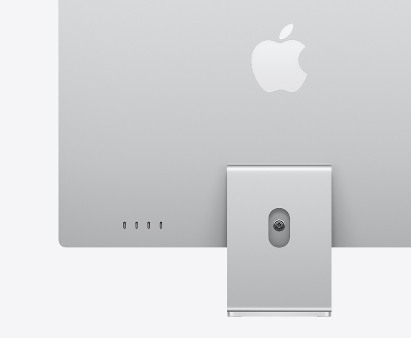 银色 iMac 背面外观，突出展示 4 个 USB-C 端口。