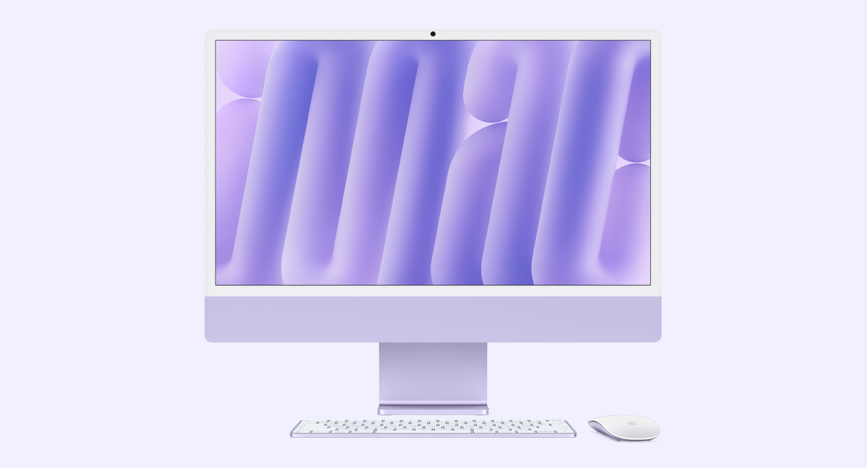紫色 iMac 正面外观，搭配同色系妙控鼠标和妙控键盘。