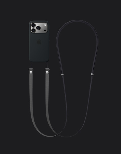 银色 iPhone 17 Pro 背面外观，机身上装有 iPhone 17 Pro 专用 MagSafe 硅胶保护壳的黑色款，保护壳上挂着深灰色斜挎挂绳。