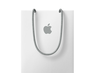 白色 Apple 购物袋，靠近顶端位置印有 Apple 标志