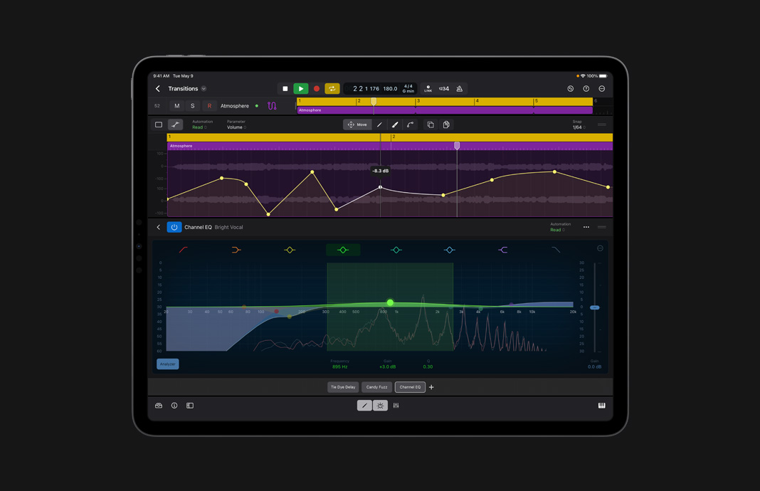 iPad Pro 特写视图展示 iPad 版 Logic Pro 的混音控制台上的通道条