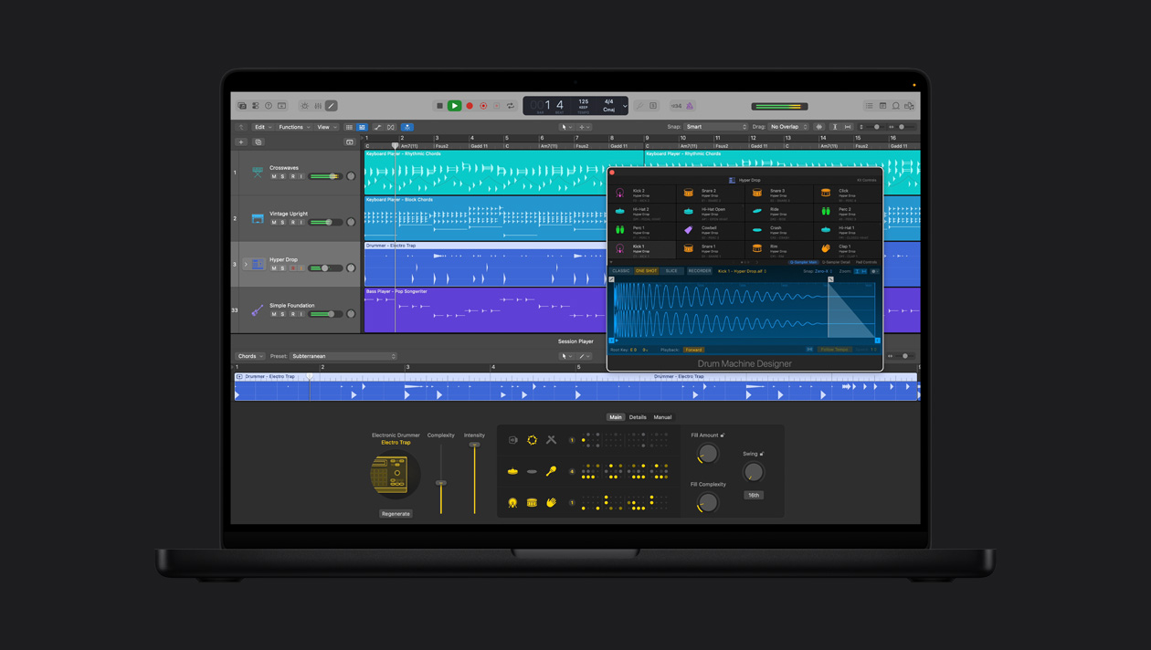 16 英寸 MacBook Pro 屏幕显示电子乐鼓手，Hyper Drop 窗口呈打开状态，展示 Drum Kit Designer；左侧一列为 Crosswaves、Vintage Upright、Hyper Drop、Simple Foundation，底部为 Electronic Drummer Electro Trap 控制项。