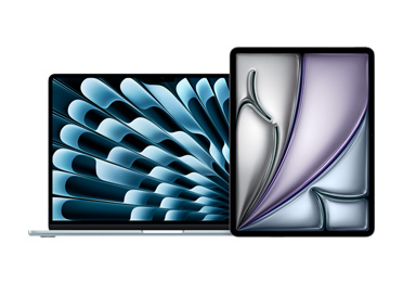 MacBook Pro 和 iPad 并排摆放。