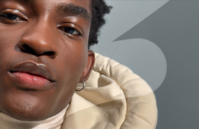 一张男子面部特写照片,展示润饰工具。