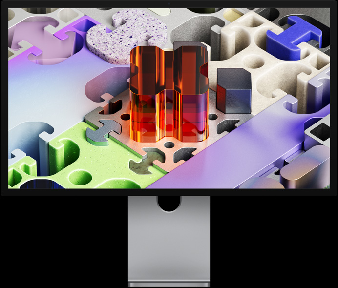 Studio Display XDR 的正面视图，展示拼图风格的三维墙纸