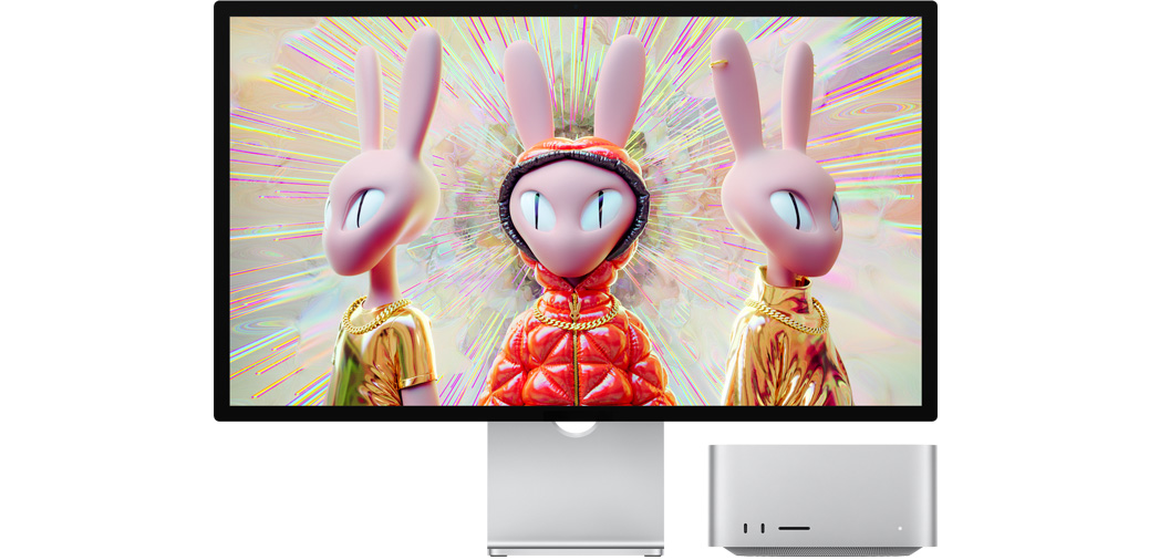 Mac Studio 和 Studio Display 并排放置，屏幕上展示三维人形兔形象图片。