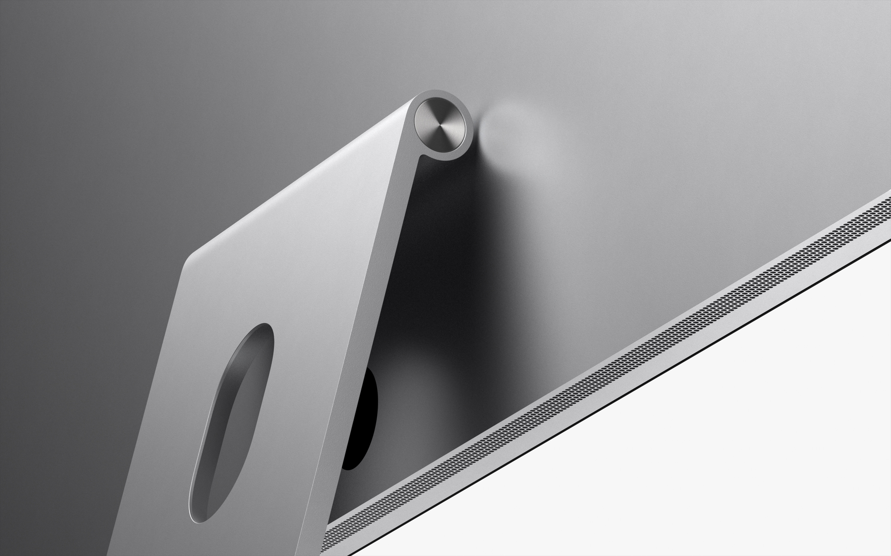 Studio Display 装有可调倾斜度的支架，展示背面视图。