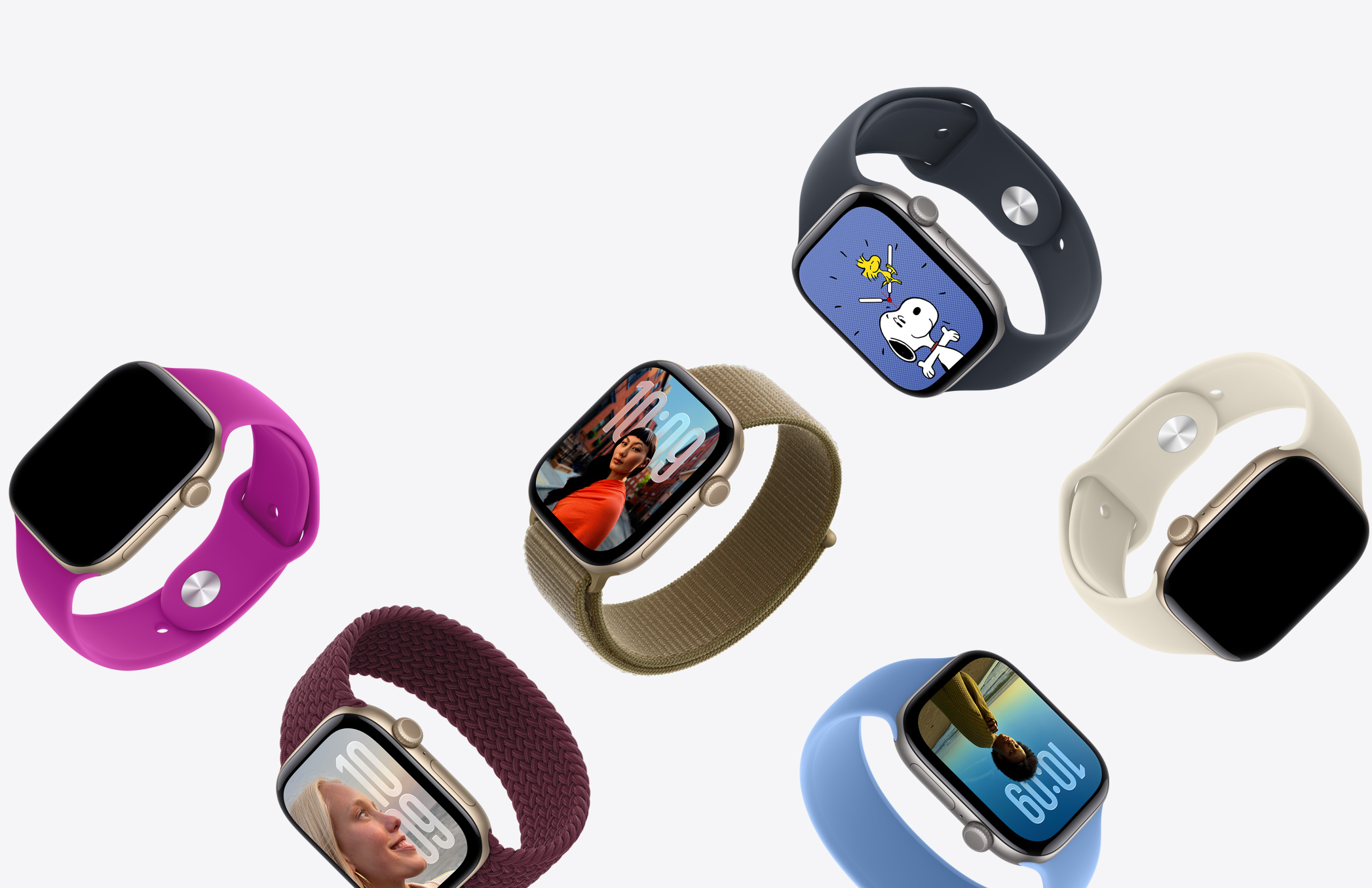 多只 Apple Watch 手表，展示各种表盘和表壳材质，搭配多款缤纷配色的表带。